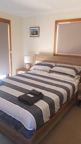 Postel nebo postele na pokoji v ubytování Parndana Hotel Cabins
