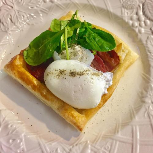 a piece of food with a egg on a plate at The Nutmeg Vermont in Wilmington