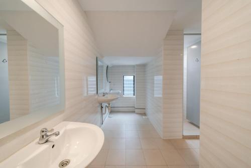 Kylpyhuone majoituspaikassa K2 Guesthouse