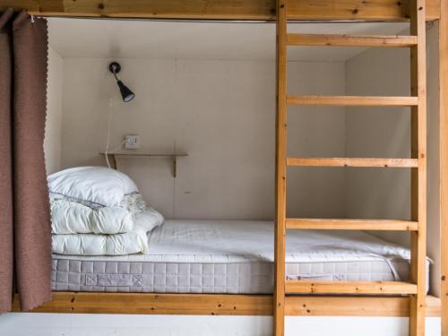 Postel nebo postele na pokoji v ubytování Hi Grey Hostel Xingping