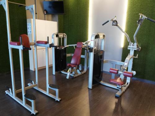 a group of exercise equipment in a room at Green Haven Homestay in Pasir Gudang