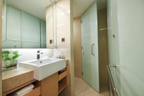 A bathroom at Cosmo Hotel Kuala Lumpur