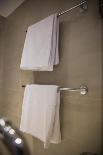 Koupelna v ubytování Naylover Hotel Suites