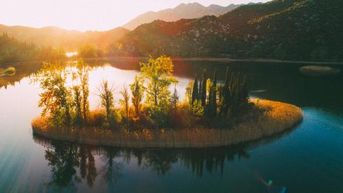 an island in the middle of a lake at Apartments Barbir in Ploče