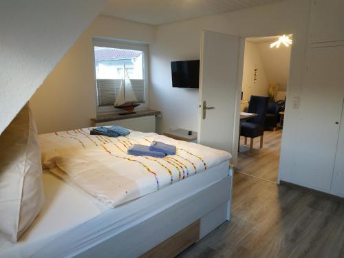 מיטה או מיטות בחדר ב-" noch ne Brise"