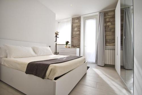Posteľ alebo postele v izbe v ubytovaní Cortiletto