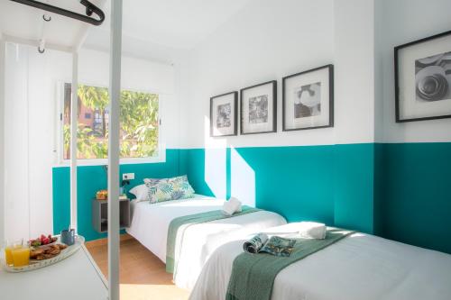 Cama o camas de una habitación en SingularStays Marina