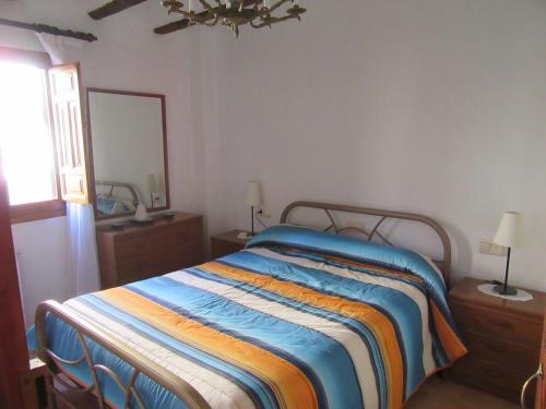 Cama o camas de una habitación en Casa Joaquín - Apartamentos