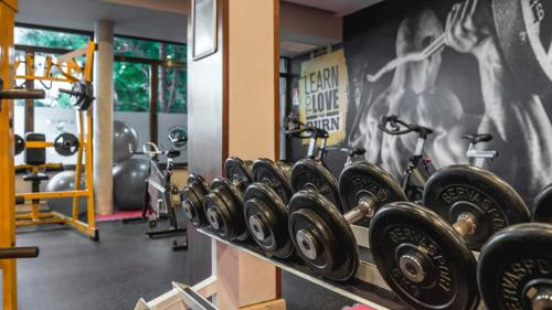 a row of dumbbells in a gym at Hotel Be Live Adults Only Marivent in Palma de Mallorca