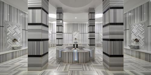 a rendering of a lobby with a fountain at TUI MAGIC LIFE Belek in Belek