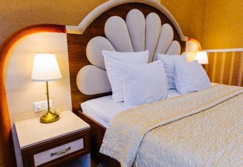 Un ou plusieurs lits dans un hébergement de l'établissement Donskaya Riviera Hotel