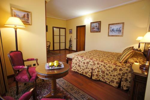 Postel nebo postele na pokoji v ubytování Hotel Montermoso