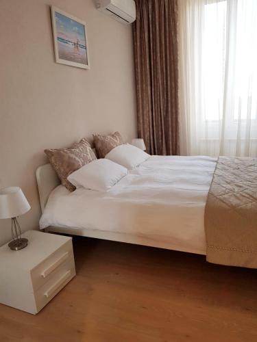 Krevet ili kreveti u jedinici u okviru objekta Charming Apartment on the boarder of Monaco