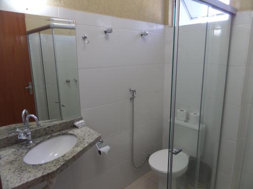 Um banheiro em Hotel CTC