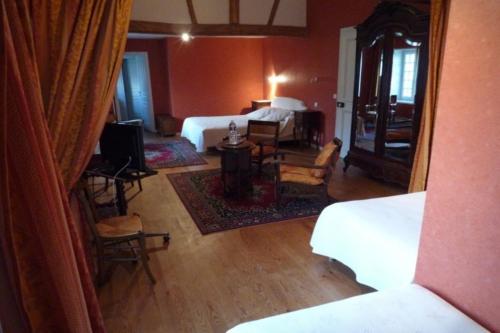 Postel nebo postele na pokoji v ubytování Château de Behen