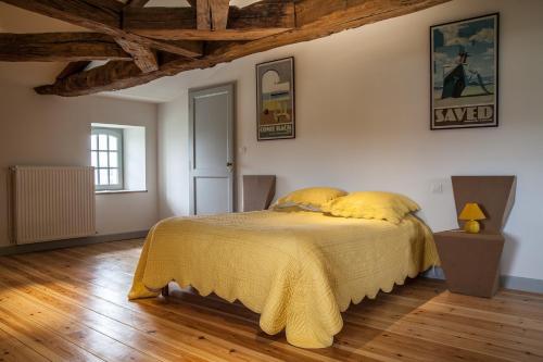 Ένα ή περισσότερα κρεβάτια σε δωμάτιο στο Chateau De Champdolent