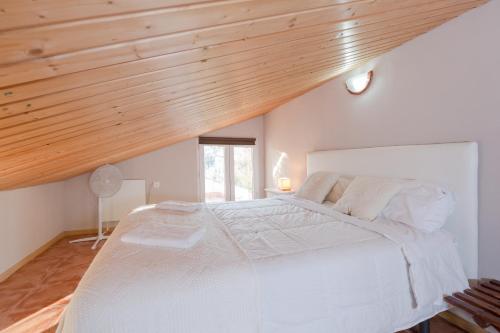 Posteľ alebo postele v izbe v ubytovaní Villa Lago Sol