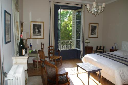 Posteľ alebo postele v izbe v ubytovaní Château des Charmes