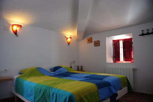 Molino de Las Tablas tesisinde bir odada yatak veya yataklar