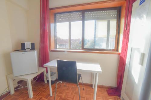 Quarto com 4 camas (Beliches+ 1 Sofá-cama)