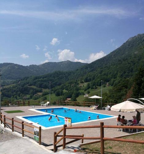 Bazén v ubytování Residence La Pineta nebo v jeho okolí