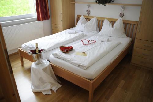 Un pat sau paturi într-o cameră la Flößerdorf Großraming