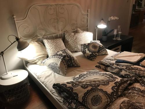Stare Miasto Długa 8 tesisinde bir odada yatak veya yataklar