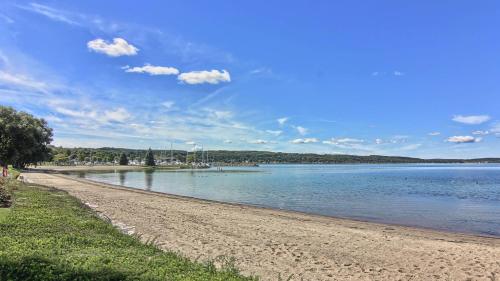 a view of a beach on a sunny day at 209 Water Street Inn in Boyne City