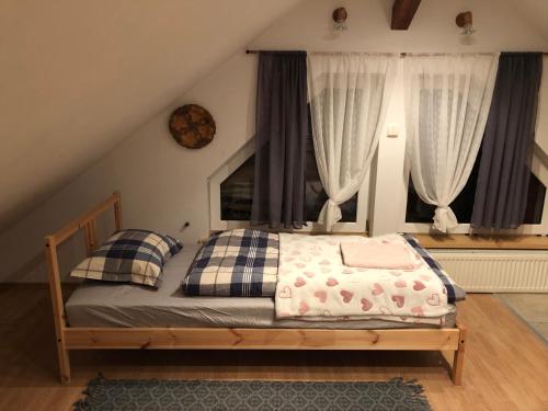 Cama ou camas em um quarto em Plan Be Gałkowo
