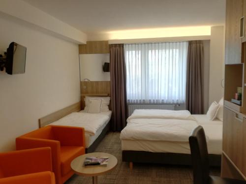 Rúm í herbergi á Hotel Empire