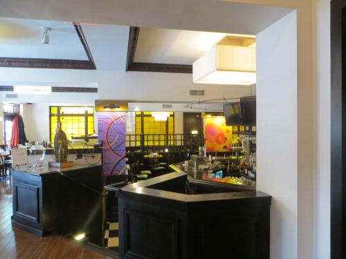 a kitchen with a sink and a counter top at Carleton of Oak Park in Oak Park