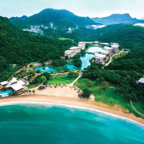 an aerial view of a resort on a beach at Creys Condo 2 at Pico de Loro Cove in Nasugbu