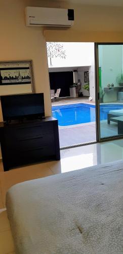 Una cama o camas en una habitación de Suites Lagunas