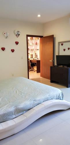 Una cama o camas en una habitación de Suites Lagunas