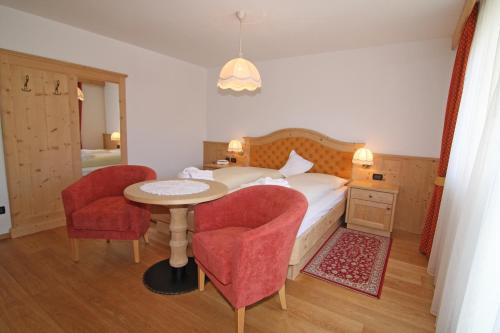 Postel nebo postele na pokoji v ubytování Hotel Talblick