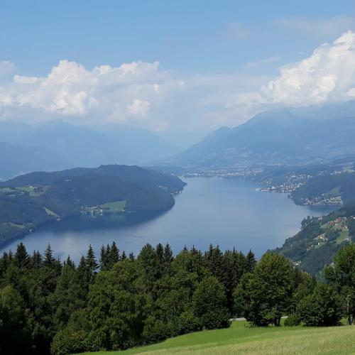 a view of a lake in the mountains at Haus Mup in Spittal an der Drau