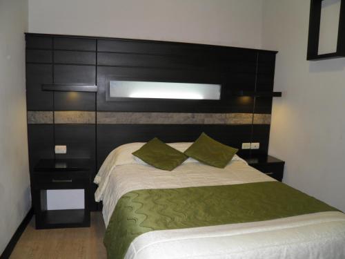 Postel nebo postele na pokoji v ubytování Hotel Majestic 2 by HHG