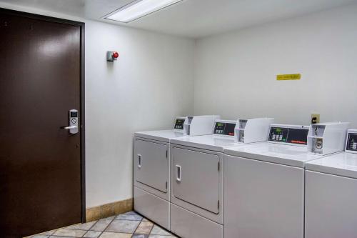 an empty room with machines and a door at Motel 6-Wilsonville, OR - Portland in Wilsonville