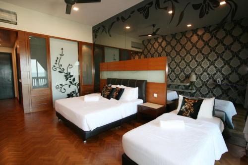 Tempat tidur dalam kamar di Profolio @ Straits Quay