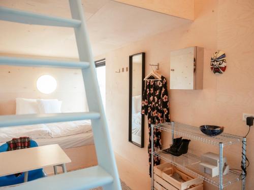 Postel nebo postele na pokoji v ubytování Containerhus 18b