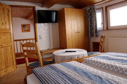 Postel nebo postele na pokoji v ubytování Pension WoGi