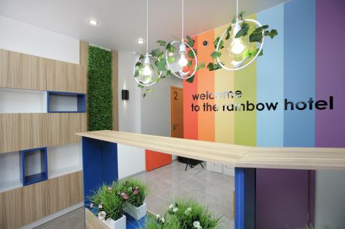 a colourful lobby with a welcome to his rainbow hotel at Hotel Raduga in Krasnoyarsk