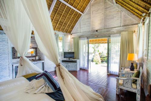 Photo de la galerie de l'établissement Bay Shore Huts, à Nusa Lembongan