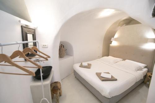 Voodi või voodid majutusasutuse Opsis Cave House toas