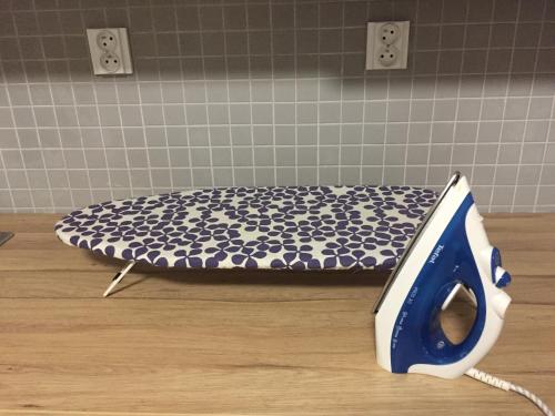 a mattress sitting on a table in a room at SATYS Apartments in Ostrava