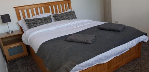 Postel nebo postele na pokoji v ubytování Maplewell House