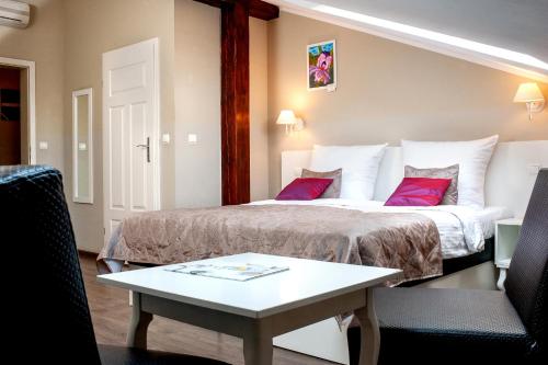 Cama o camas de una habitación en Leone Aparthotel