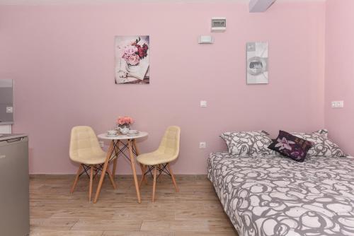 Posteľ alebo postele v izbe v ubytovaní Studio Apartment Deluxe
