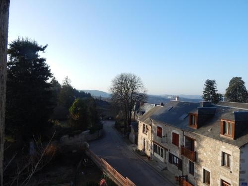 an aerial view of a street in a village at Le Lion D'or in Ouroux en Morvan