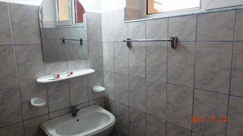 Een badkamer bij Vila Europa